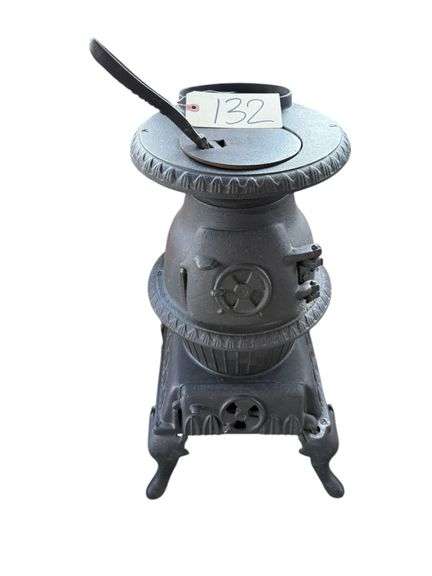 VINTAGE CAST IRON POTBELLY STOVE image
