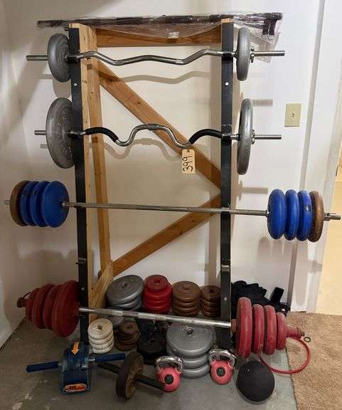 FOUR BARBELLS WITH WEIGHTS, ADDITIONAL WEIGHTS (SOME STEEL, SOME PLASTIC), KETTLE BELLS, MEDICINE BALL AND ABDOMINAL EXERCISERS image