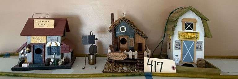 THREE DECORATIVE BIRD HOUSES: ONE IS A COUNTRY STORE, ONE CHARLIE'S PLACE AND THE OTHER ONE IS OUR SUMMER HOME image