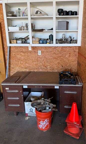 SIX DRAWER METAL DESK, ORANGE CAUTION CONES, LARGE WHEELS (POSSIBLY FOR SCAFFOLDING), ASSORTMENT OF PLUMBING TOOLS, GAS BURNER, BERNZOMATIC CYLINDERS, ETC. image