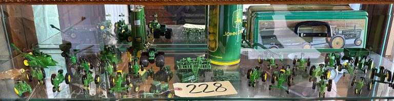 LARGE ASSORTMENT OF MINIATURE JOHN DEERE DIE-CAST TRACTORS AND IMPLEMENTS, SMALL CHILDREN’S JOHN DEERE TOOL BOX, JOHN DEERE CANDY CANDY CANISTER image