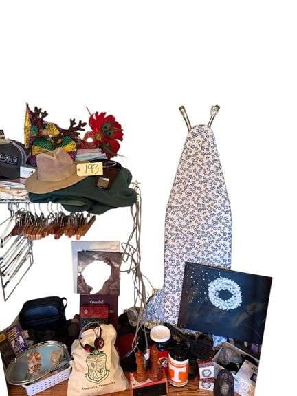 CLOSET LOT TO INCLUDE ASSORTMENT OF HATS, BUC-EE’S MUG, UNIV. TENNESSEE MUG, HANDCRAFTED WOODEN PUZZLES, IRONING BOARD, 4 BIBLICAL PRINTS AS-FOUND, WIRE CANDLEHOLDER, VCR CO-PILOT, LADIES’ GLOVES, MASQUERADE STYLE MASK, MOOD LIGHT ALARM CLOCKS, FACE MASKS, CRESCENT BEND KNOXVILLE TN TOTE BAG W/ HEADPHONES AND OTHER SMALL ASSORTMENT OF ELECTRONICS, ETC. image