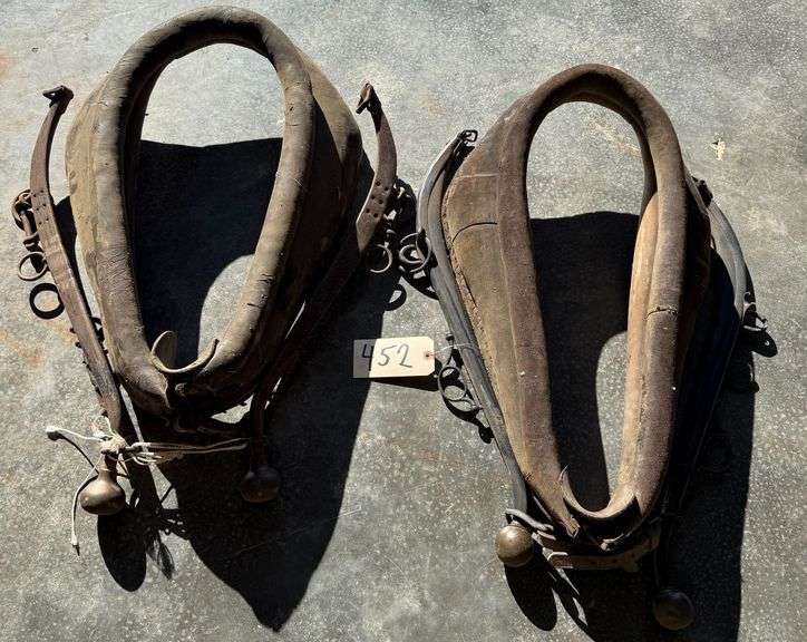 PAIR OF ANTIQUE LEATHER HORSE COLLARS WITH HAMES image