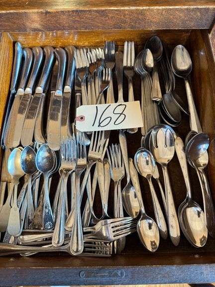 ASSORTMENT OF FLATWARE TO INCLUDE KNIVES, FORKS, TEASPOONS, SERVING SPOONS, ETC. image