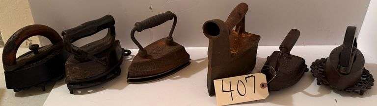 FIVE VINTAGE SAD IRONS AND ONE COAL IRON image