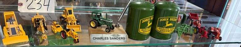 JOHN DEERE SALT AND PEPPER SHAKERS, JOHN DEERE PEN SET, 5 PIECES OF JOHN DEERE MINIATURE YELLOW IRON, MINIATURE JOHN DEERE TOY CULTIVATOR; 5 OTHER MINIATURE TOY TRACTORS TO INCLUDE ALLIS-CHALMERS, MASSEY FERGUSON, AND CASE image