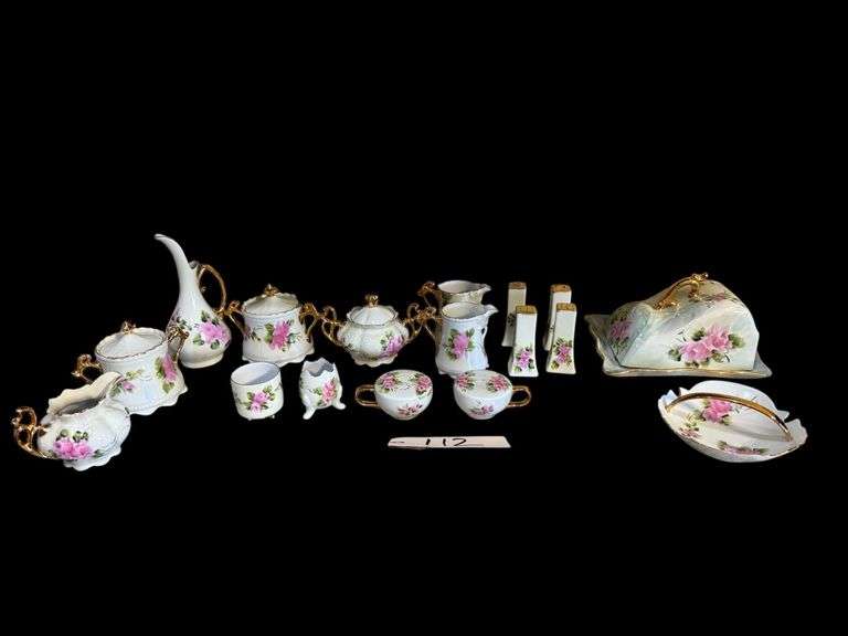 APPROX. 17 PIECES OF PORCELAIN W/ ROSE DESIGN AND GOLD TRIM: SALT & PEPPER SHAKERS, SLANTED BUTTER DISH, CREAM AND SUGARS, HANDLED CANDY DISH, TOOTHPICK HOLDER, ETC. image