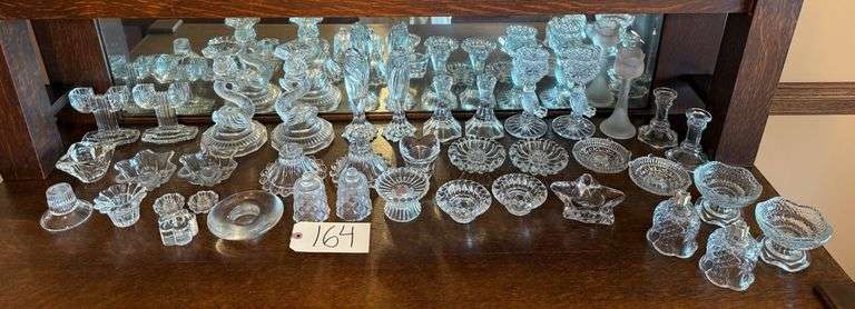APPROX. 39 CLEAR GLASS CANDLEHOLDERS TO INCLUDE PRESSED GLASS, PATTERN GLASS, AND OTHERS image