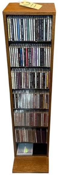 CD SORTER RACK TO INCLUDE ARTISTS SUCH AS GARTH BROOKS, CLINT BLACK, ALABAMA, DIAMOND RIO, ALAN JACKSON, COLIN RAYE, AARON TIPPIN, AND MANY MORE image