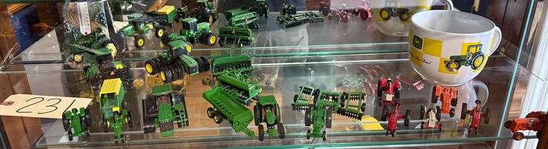 ASSORTED MINIATURE DIE-CAST TRACTORS AND IMPLEMENTS TO INCLUDE FORD, CASE, INTERNATIONAL, MANY JOHN DEERE; JOHN DEERE COFFEE MUG image