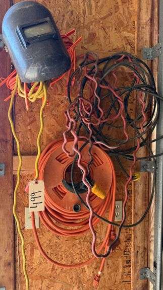 LOT OF EXTENSION CORDS WITH WELDING HELMET image