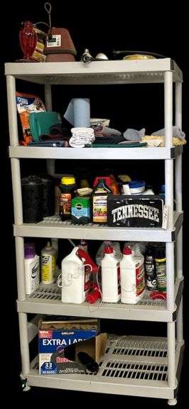 PLASTIC 5 SHELF UNIT WITH CONTENTS: 2 SPIGOT COVERS, HUMMINGBIRD FEEDER, SHOP TOWELS, CAR WASH TOWELS, TN LICENSE PLATE, SEVERAL JUGS OF PEST CONTROL PRODUCTS, WASP AND HORNET SPRAY, PARTIAL BOX OF TRASH BAGS image