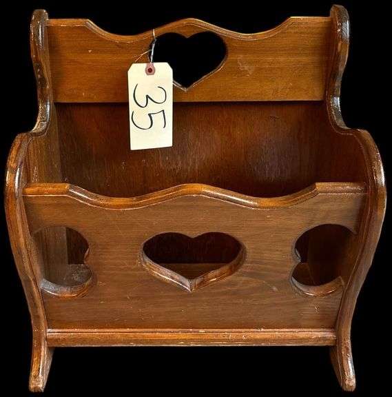 WOODEN MAGAZINE RACK W/ HEART-SHAPED CARVINGS image