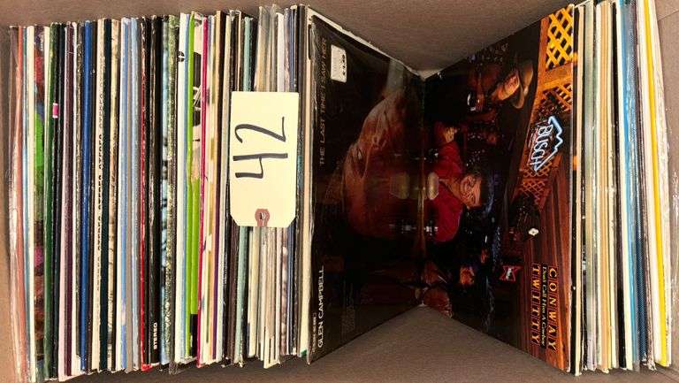 APPROXIMATELY 120 VINYL RECORDS TO INCLUDE ELVIS PRESLEY, JOHNNY CASH, FRANK SINATRA, JOHNNY MATHIS, TANYA TUCKER, RONNIE MILSAP, LYNN ANDERSON, ARETHA FRANKLIN, CONWAY TWITTY, DIANA ROSS AND THE SUPREMES, MERLE HAGGARD, KENNY RODGERS, DOTTIE WEST, NEIL DIAMOND, LEE GREENWOOD, PATSY CLINE, LORETTA LYNN, CHARLEY PRIDE, WAYLON JENNINGS, AND MANY MORE!