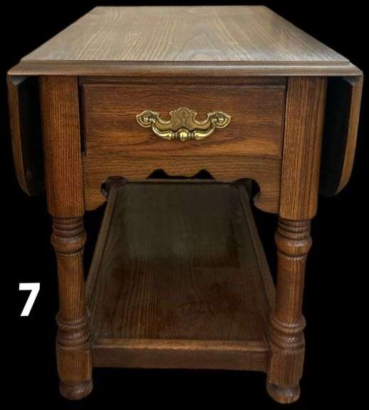 APPEARS TO BE OAK DROP-LEAF END TABLE WITH DRAWER AND BRASS PULL