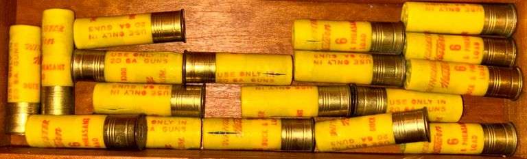 WOODEN GUN RACK WITH TWO DRAWERS - INCLUDES SHOTGUN SHELLS AND BULLETS FOUND IN DRAWERS (MOSTLY AS-FOUND)