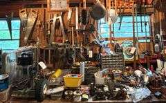 ORGANIZERS WITH ASSORTED NUTS, BOLTS, AND SCREWS; HAMMERS, SLEDGE HAMMER, HAND SAWS, SHELTON HAND CLAMPER, TWO SQUARES, ASSORTED DRILL BITS, DOVETAIL SAW, LEVELS, AIR COMPRESSOR ACCESSORY KIT, TAPE MEASURES, 18 GAUGE BRAD NAILER 5/8 TO 1-1/4 IN LENGTH, CAMPBELL HAUSFELD 1-1/4 BRAD NAILER, ASSORTED SCREW DRIVERS, ETC. - CLAMPS AND HOLOW CHISEL MORTISER NOT INCLUDED