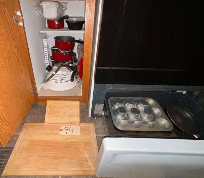 ASSORTMENT OF POTS, PANS, STRAINER, AND 2 CUTTING BOARDS image