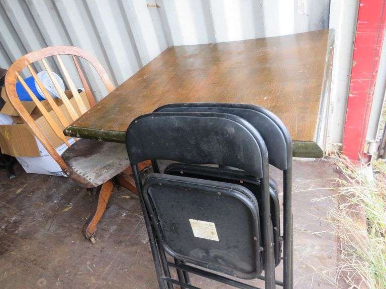 Table and odd chairs