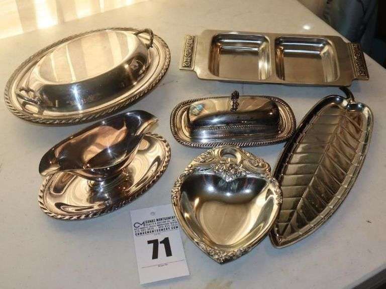 Variety of Silver Plate Items: Serving Dish with lid, Gravy Boat with attached Plate, Divided Tray, Leaf Shaped dish Heart Shaped Dish, Butter Dish with lid and glass dish etc. image