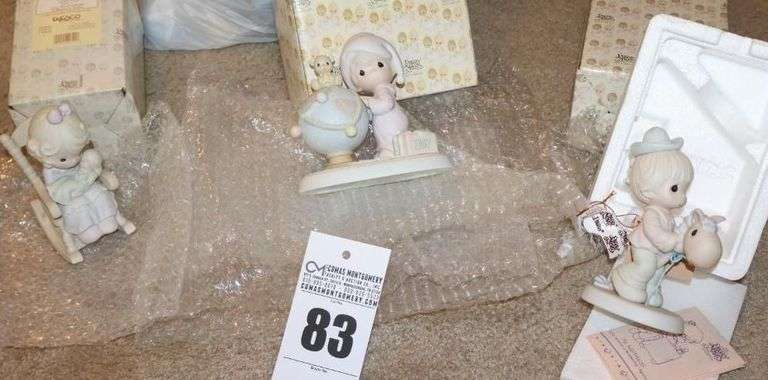 Precious Moments Porcelain Items:  3 - "May Your World be Trimmed in Joy" 1991, "Love Never Leaves a Mother's arms"1995, "Hope You're Up & on the Trail Again" 1989 - All in original Boxes image