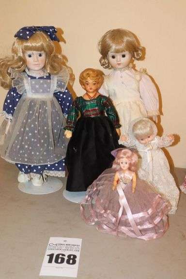 Variety of Vintage Dolls : Porcelain/cloth etc. 4 stands image