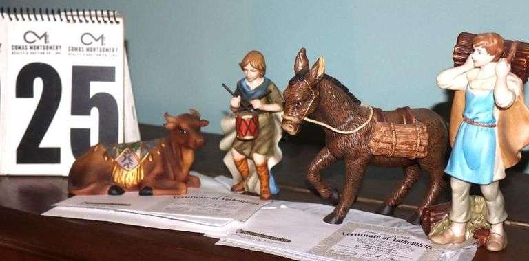 Bradford Exchange Thomas Kinkade Hawthorne Village Nativity "Star of Hope" Collection: 4 Characters - Shephard Lad (A156), Trusted Companion (A1756), Little Drummer Boy (E4932), & Seated Bull (E4932)                              Each piece is hand-painted bisque porcelain and  most are numbered with certificate  ****Lots #18 - 31 have pieces of collection image