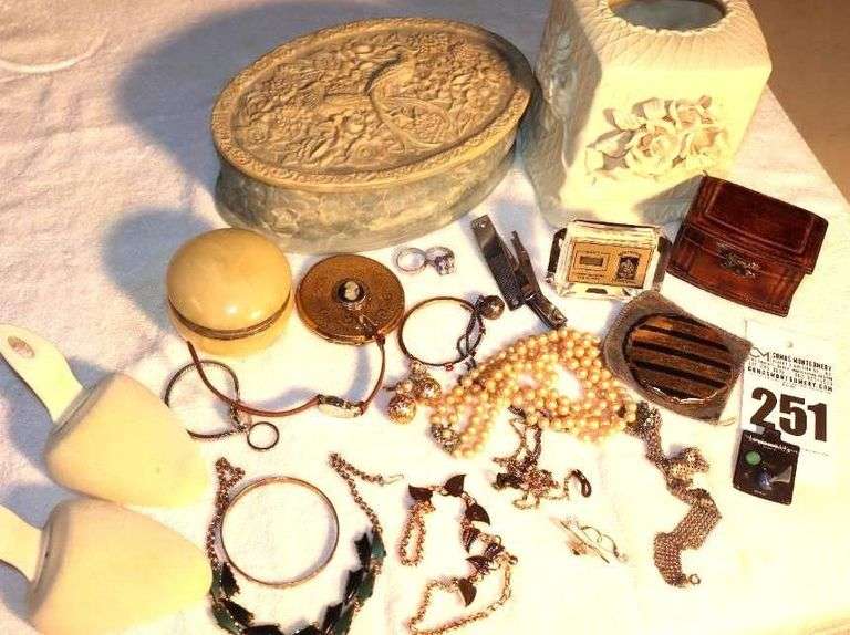 Variety of Ladie items: Lidded Box with a few items, Tissue Holder, Rings, Watch, Necklaces, Bracelets, Earrings, Pins, Clock, Jewelry boxes, etc. image