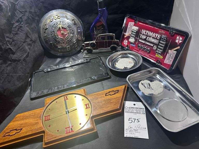 Packard Clock, Chevy Clock, two magnet trays, Stain Glass Car, Car Polish, 2 License Plate Covers 1 is a Parkard image