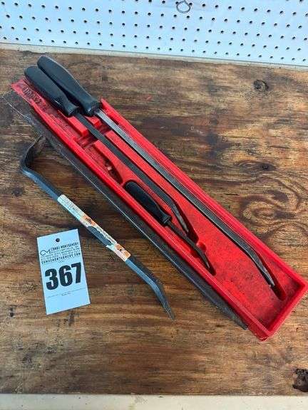 Assorted Tools Including Pry Bars, Drill Bits, and Extractors image