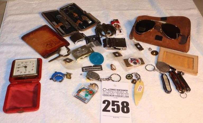 Variety of Men's items: Wallet, Belt Buckles, Lighter, Clock, Money clip, Knives, Keychains, Pins,  Sunglasses, Etc. image
