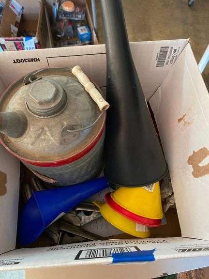 Metal Oil Can with Funnels and Automotive Tools image