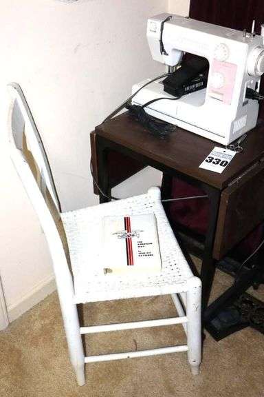 Vintage Janome Limited Edition Sewing Machine on Drop side Table (42"x30" - 36") open with White straight back chair image