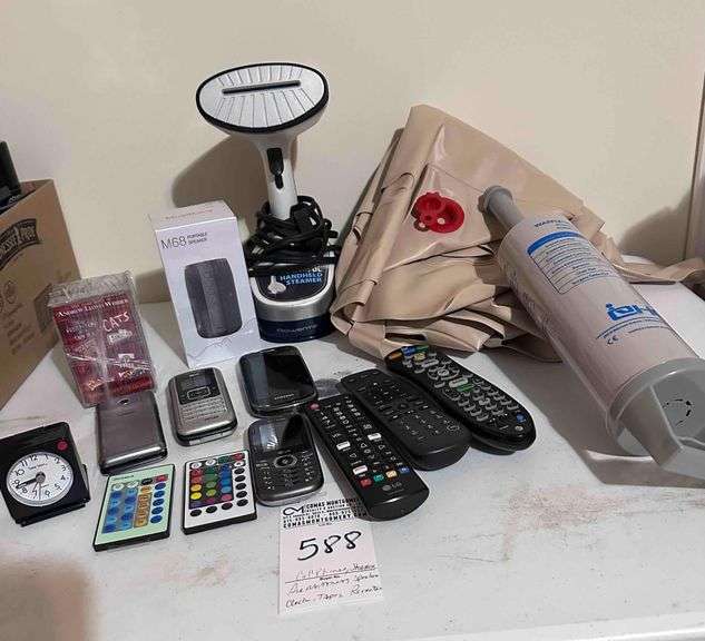 4 - Cell Phones, Travel Clock, Portable Speaker, Handheld Steamer, Air Mattress & Pump, Cassette Tapes image