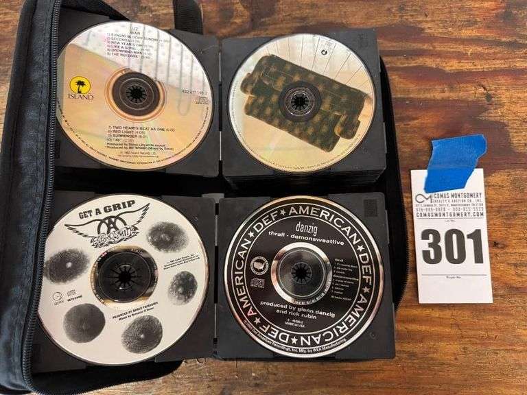 Collection of CDs: Ozzy Osbourne, Aerosmith, Van Halen, and More image