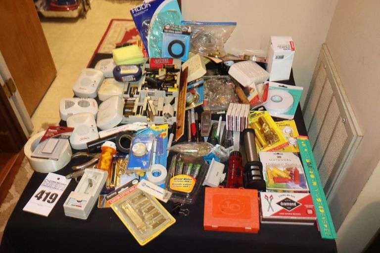 Variety of Tool/Items: Battery Charger/Tester Kit, Sunbeam Ionizers, Sliders for chairs, Matches, Hooks, Chain Locks (new0, 2 On Switches for Lights in doorways (new), Tape, Razors Dimmer Switch (new ) etc. image