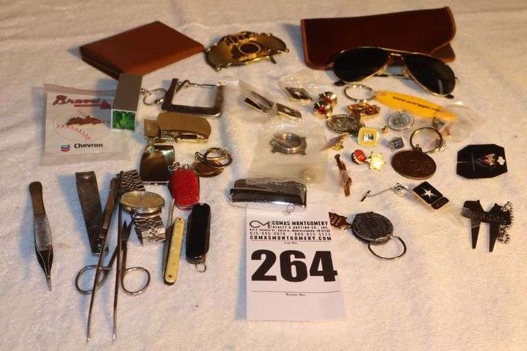 Variety of Men's items: Wallet, Belt Buckles, Lighter, Knives, Keychains, Pins,  Sunglasses, Etc. image