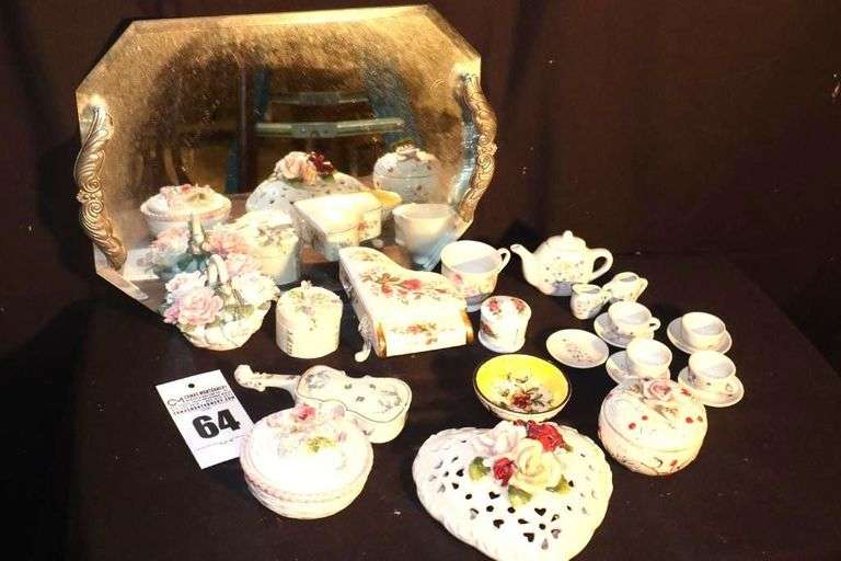 Mirrored Tray with Variety of Porcelain items: Tea Set, Flowers, Lidded Containers etc. image