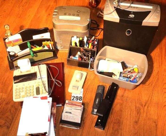 Variety of office items: 2 Note Racks, 2 Paper Shredders, Calculator, Stationary, Pencils, Pens, Pads. Stapler, Tape etc. image