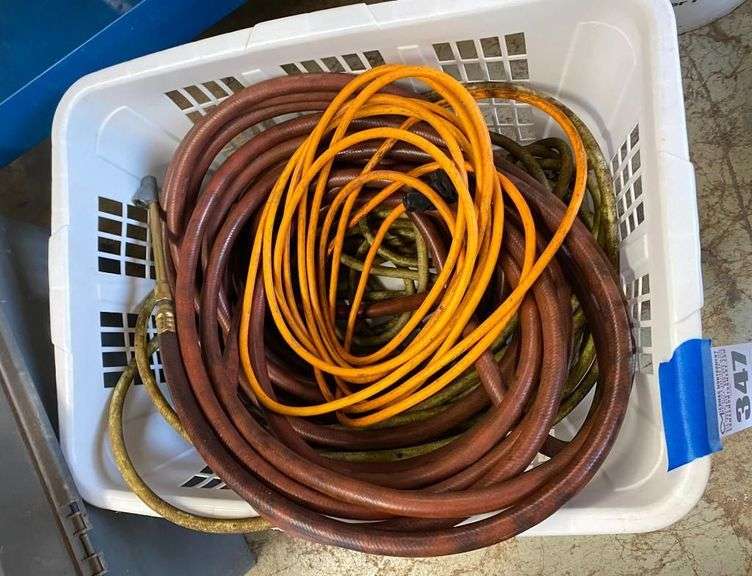 Basket of Air Hoses and Extension Cord image