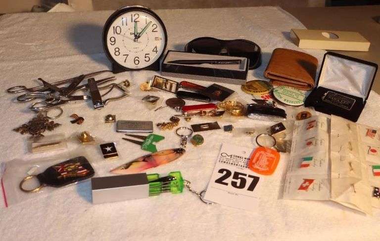 Variety of Men's items: Wallet, Belt Buckles, Lighter, Watch, Clock, Knives, Keychains, Pins, Sunglasses,  Etc. image