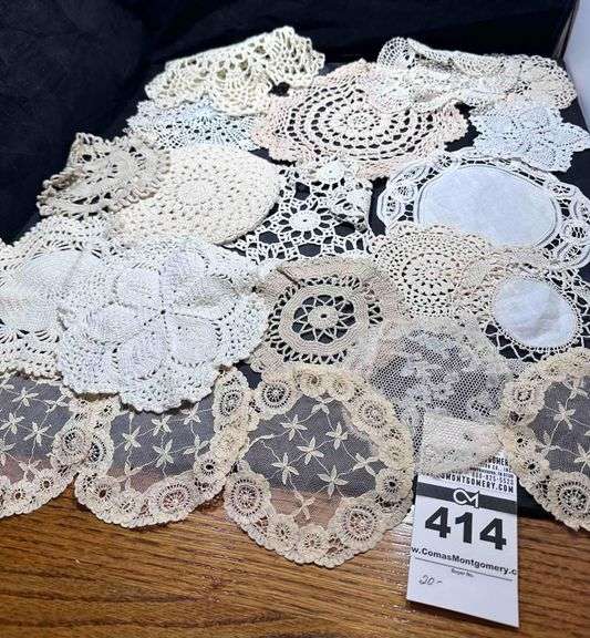 Large lot of Doilies image
