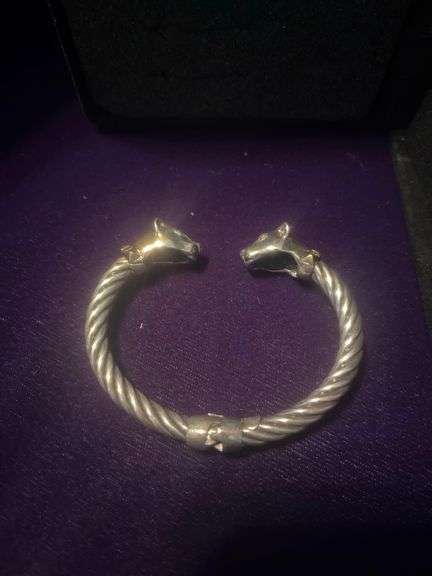 Silver Cable-Style Cuff Bracelet with Ornate Tips and Gold Accents image