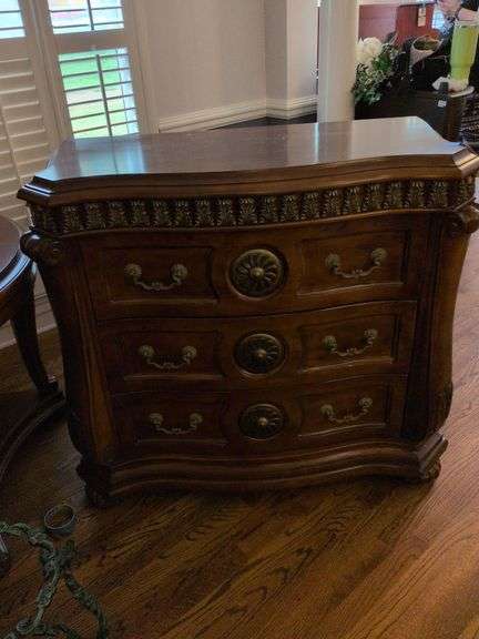 Traditional-Style Wood Dresser with Carved Details and Three Drawers image
