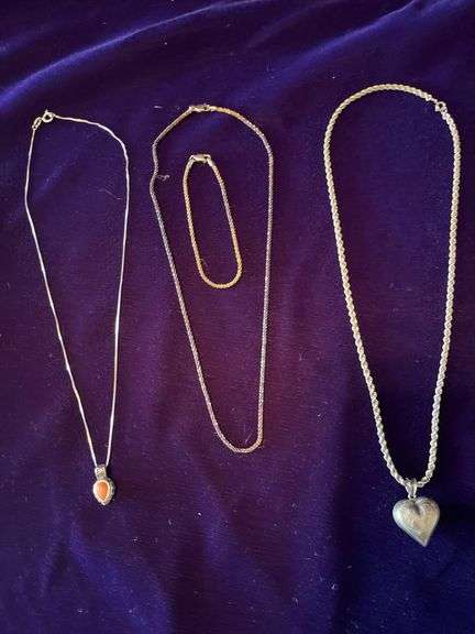 3 Necklaces and a Bracelet image