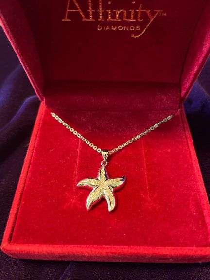Silver Starfish Pendant with Gold and Diamond Accents image