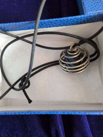 Wire Cage Pendant Necklace with a Crystal or Gemstone Inside image