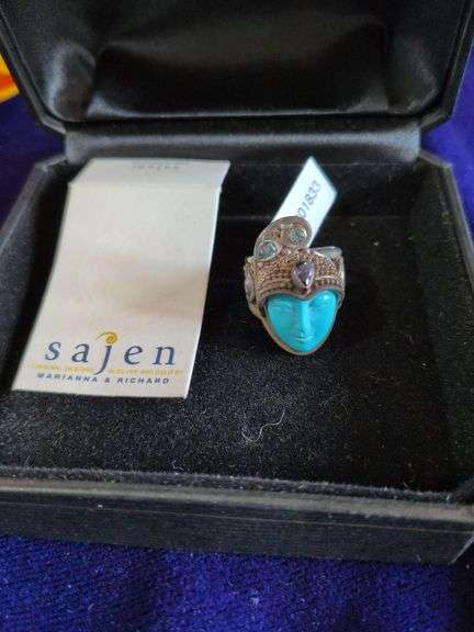 Sajen Goddess Ring with a Carved Face and Various Gemstones image