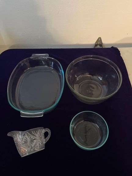 Pyrex 15”x11” Casserole Dish, Pyrex 6” Bowl, Anchor Hocking 10” Bowl and a Plastic Creamer image