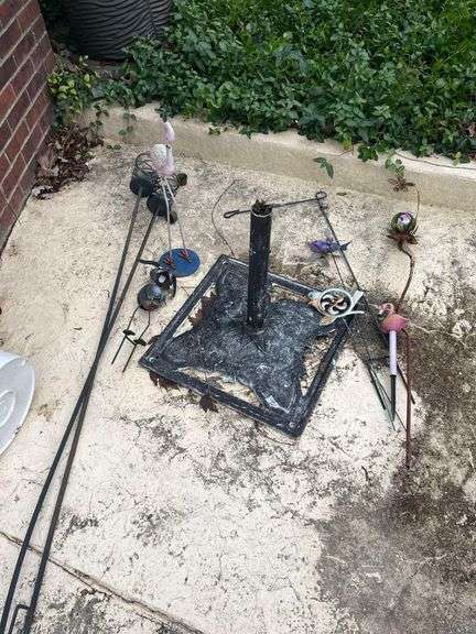 Assorted Yard Stakes and Umbrella Holder and Chimes image